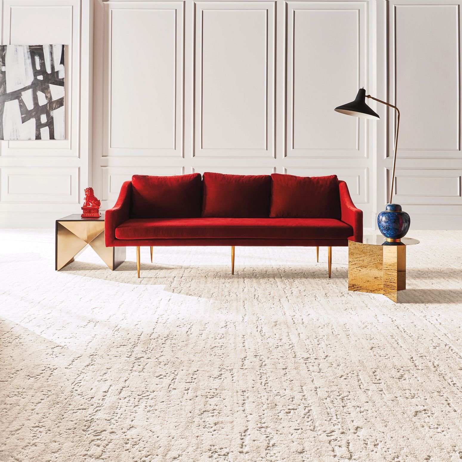 Red sofa on beige carpet from Flooring Xpress Enterprise and Design in Chicago, IL