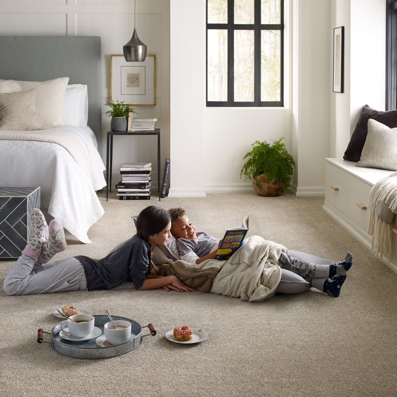 Kids reading on soft brown carpet from Flooring Xpress Enterprise and Design in Chicago, IL